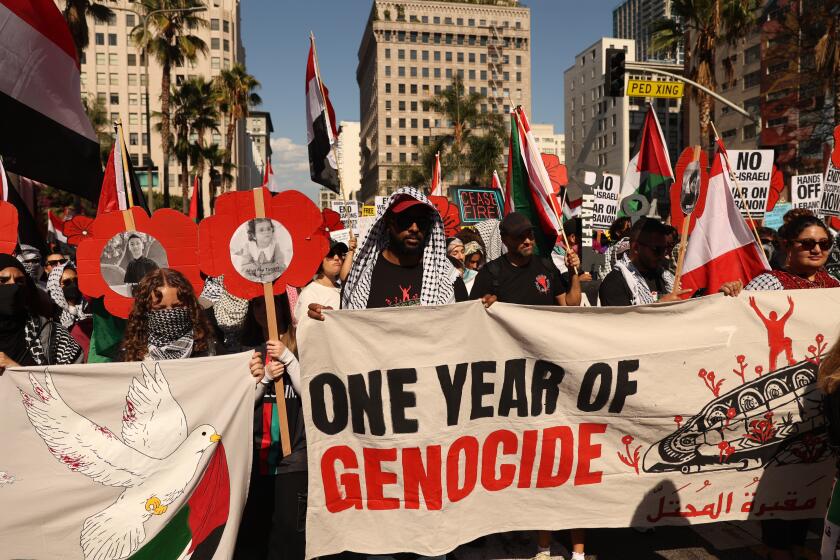 Los Angeles, CA - October 05: Pro Palestine Demonstrators rally together during a protest on the ongoing war in Gaza and Lebanon at Pershing Square on Saturday, Oct. 5, 2024 in Los Angeles, CA. (Michael Blackshire / Los Angeles Times)