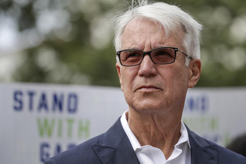 Los Angeles, CA - June 18: Los Angeles District Attorney George Gascon, joined by members of SEIU Local 2015 and other local leaders, addresses a news conference held on the steps of Hall of Justice on Friday, June 18, 2021 in Los Angeles, CA. (Irfan Khan / Los Angeles Times)