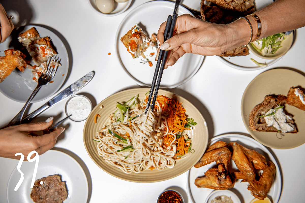 #39: A table scene as customers dine at Yang's Kitchen