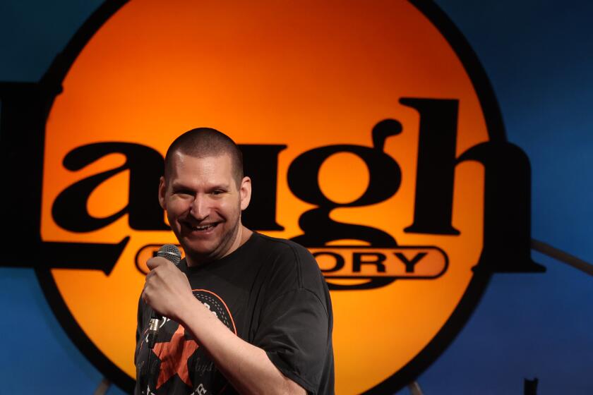 Los Angeles, CA - September 11: Comedian Joshua Meyrowitz performs during a comedy show aimed to accommodate neurodivergent people who are attendance in the audience at The Laugh Factor on Wednesday, Sept. 11, 2024 in Los Angeles, CA. (Michael Blackshire / Los Angeles Times)