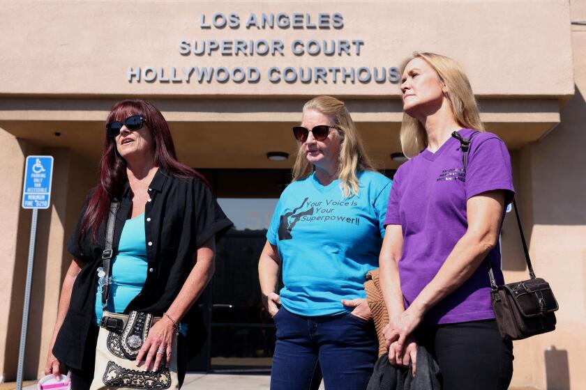 HOLLYWOOD-CA-OCTOBER 1, 2024: A group of residents from the Antelope Valley including Diane Swick, Cindy Farrow, and Mary Jeters, from left, exit the Hollywood Courthouse after attending a hearing to determine a placement recommendation for Christopher Hubbart, a violent sexual predator who was dubbed the "Pillowcase Rapist" for a series of rapes and other sex crimes, on October 1, 2024. The proposal to house Hubbard in the Antelope Valley town of Juniper Hills has brought calls from Los Angeles County Supervisor Kathryn Barger and Dist. Atty. George Gascon for residents to voice their concerns. (Christina House / Los Angeles Times)