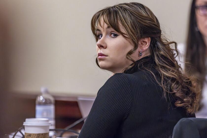 Hannah Gutierrez-Reed, the former armorer at the movie "Rust", listens to closing arguments in her trial at district court on Wednesday, March 6, 2024, in Santa Fe, N.M. (Luis Sánchez Saturno/Santa Fe New Mexican via AP, Pool)