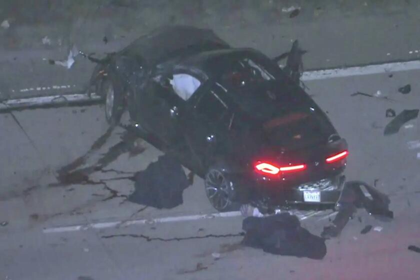 The suspects’ SUV was totaled after a rollover crash during a police pursuit in Pomona on Oct. 4, 2024. (KTLA)