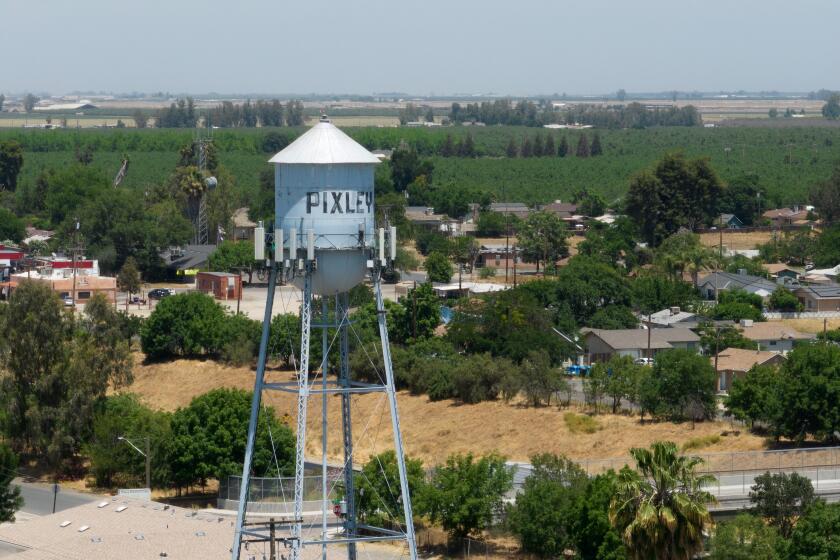 PIXLEY, CA - MAY 20: Pixley, CA is a small, unincorporated town off State Route 99 in Tulare County. Some residents believe their health problems are owed to air pollutants from the nearby dairy facilities. The topography of the San Joaquin Valley contribute to the region's poor quality trapping dirty air from traffic on State Route 99, Interstate 5, locomotives and farming pollutants including open burning and emissions from dairy cows. Photographed in Pixley, CA on Saturday, May 20, 2023. (Myung J. Chun / Los Angeles Times)