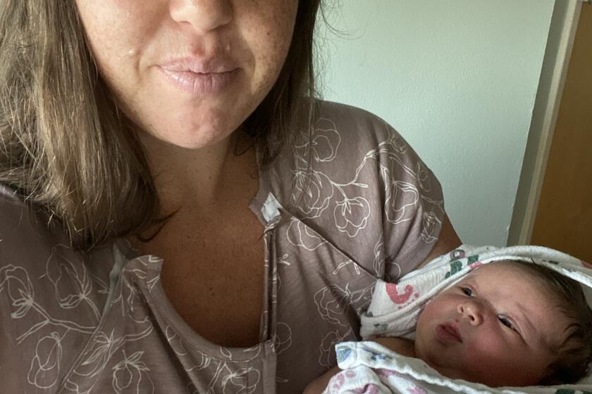 Susan Horton with her newborn daughter, Halle, in August 2022.