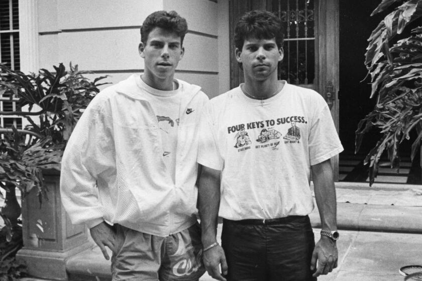 Erik Menendez, left, and is brother Lyle, in front of their Beverly Hills home. They are prime suspects in their parents murder.